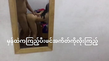 Amateur couple engages in standing sex in front of mirror